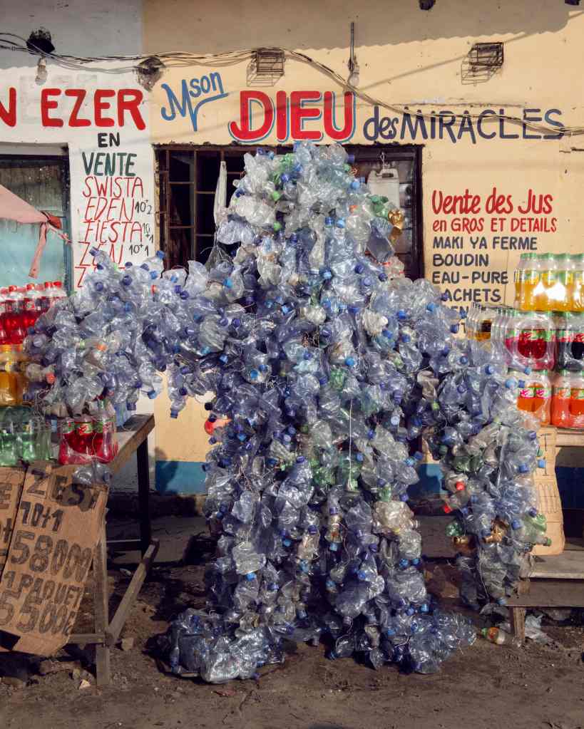 A costume created entirely from old water bottles